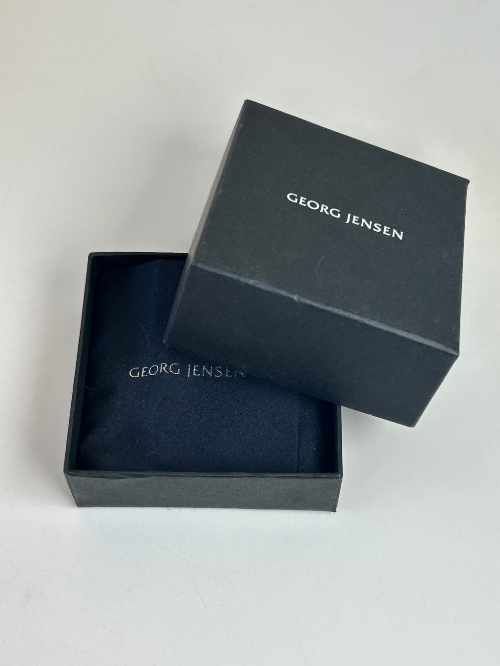 Georg Jensen Daisy hårelastik – 925S sterlingsølv &amp; sort emalje – Ø 43 mm – original æske