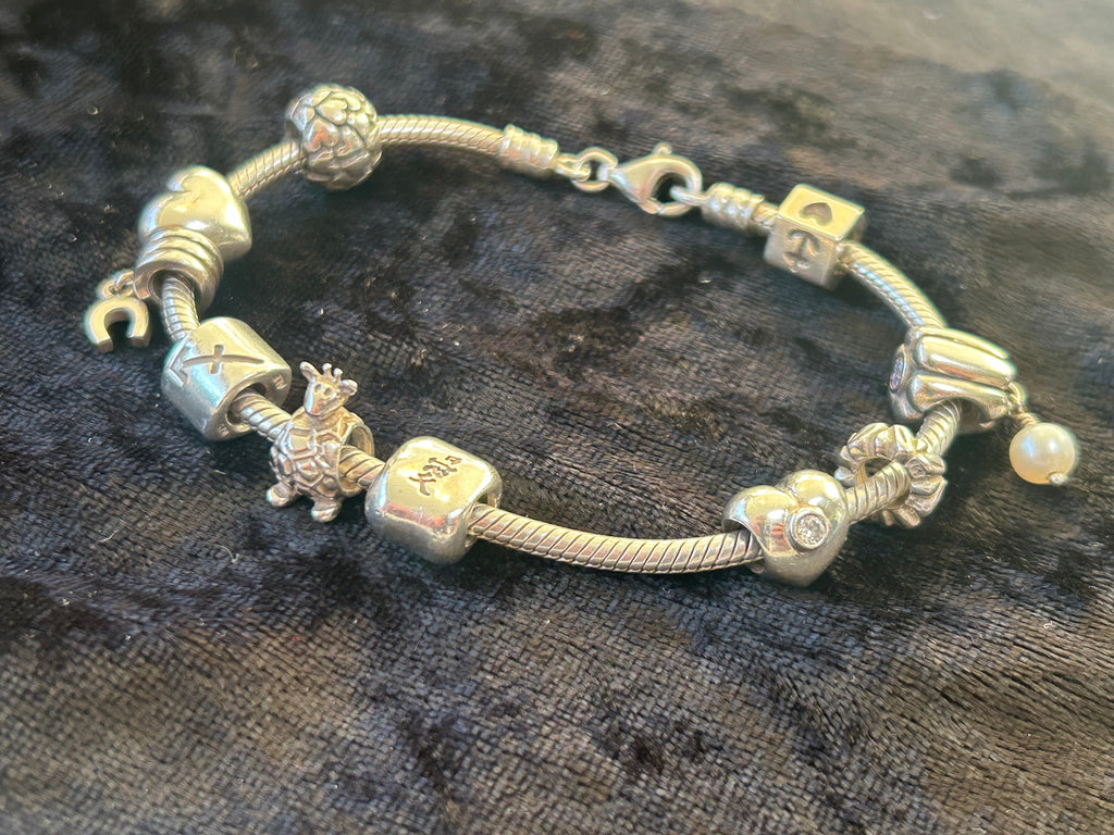Pandora sølvarmbånd med 10 charms – ALE 925