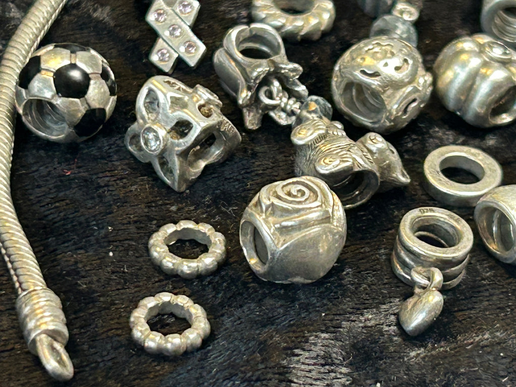 Pandora sølvarmbånd med 25 charms – ALE 925, 68 g
